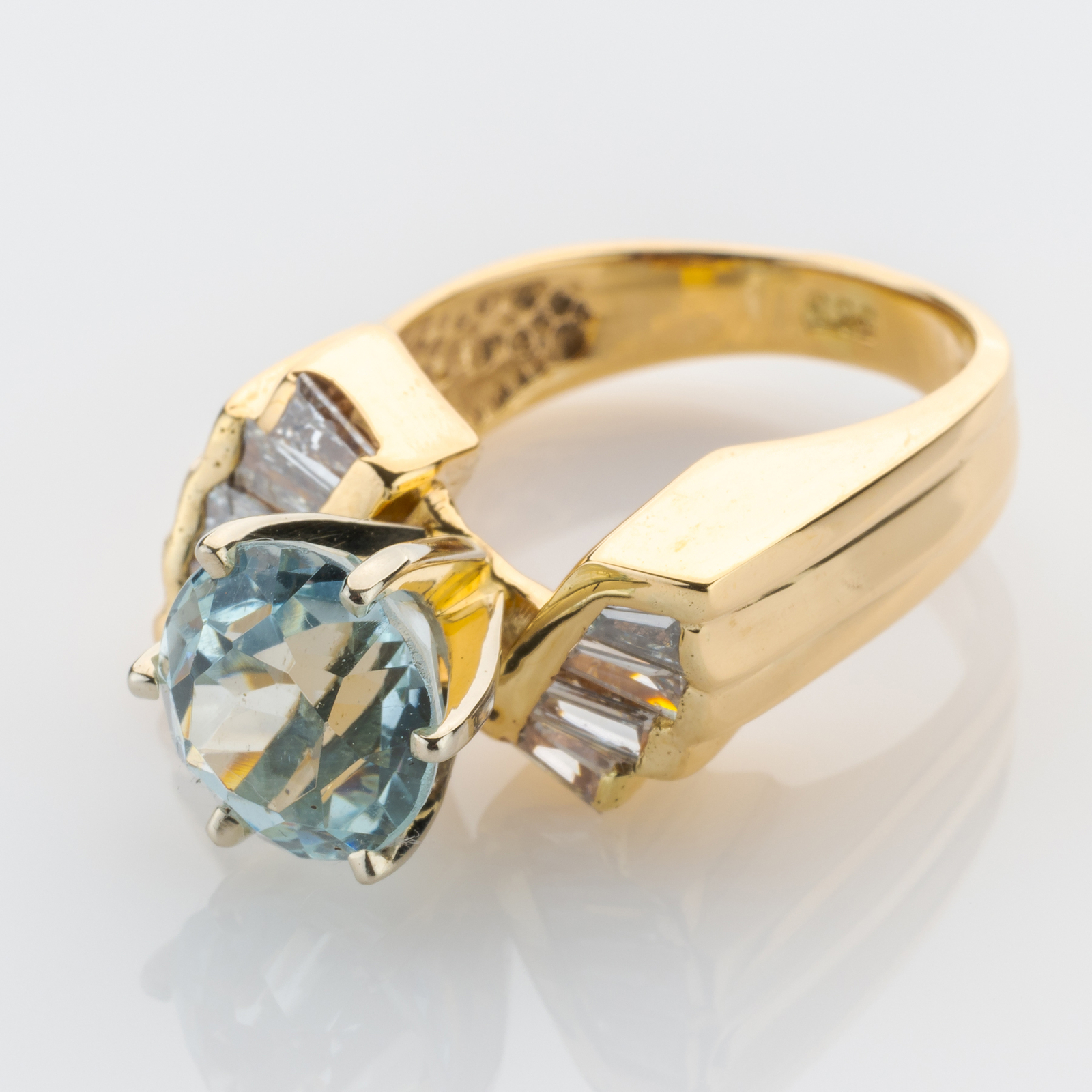 14k gold ring with an aquamarine and diamonds
