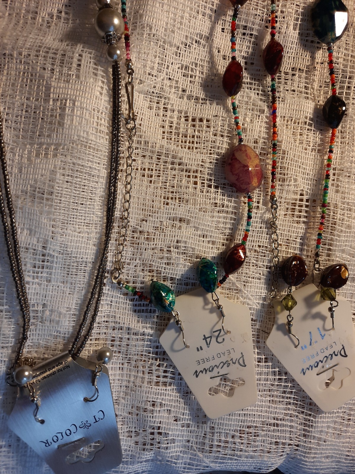 7 New In Package Necklaces,Some W/ Earrings. Pretty Sets, Unusual. Size Varies