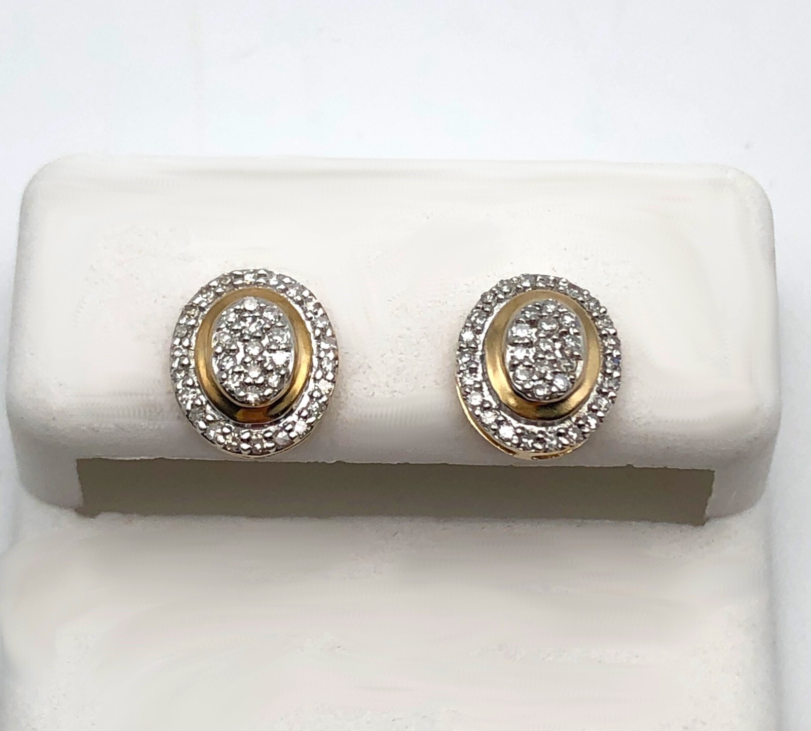 Oval Shaped 10k Yellow Gold Earrings with 0.20ctw of Diamonds 1.1 gram