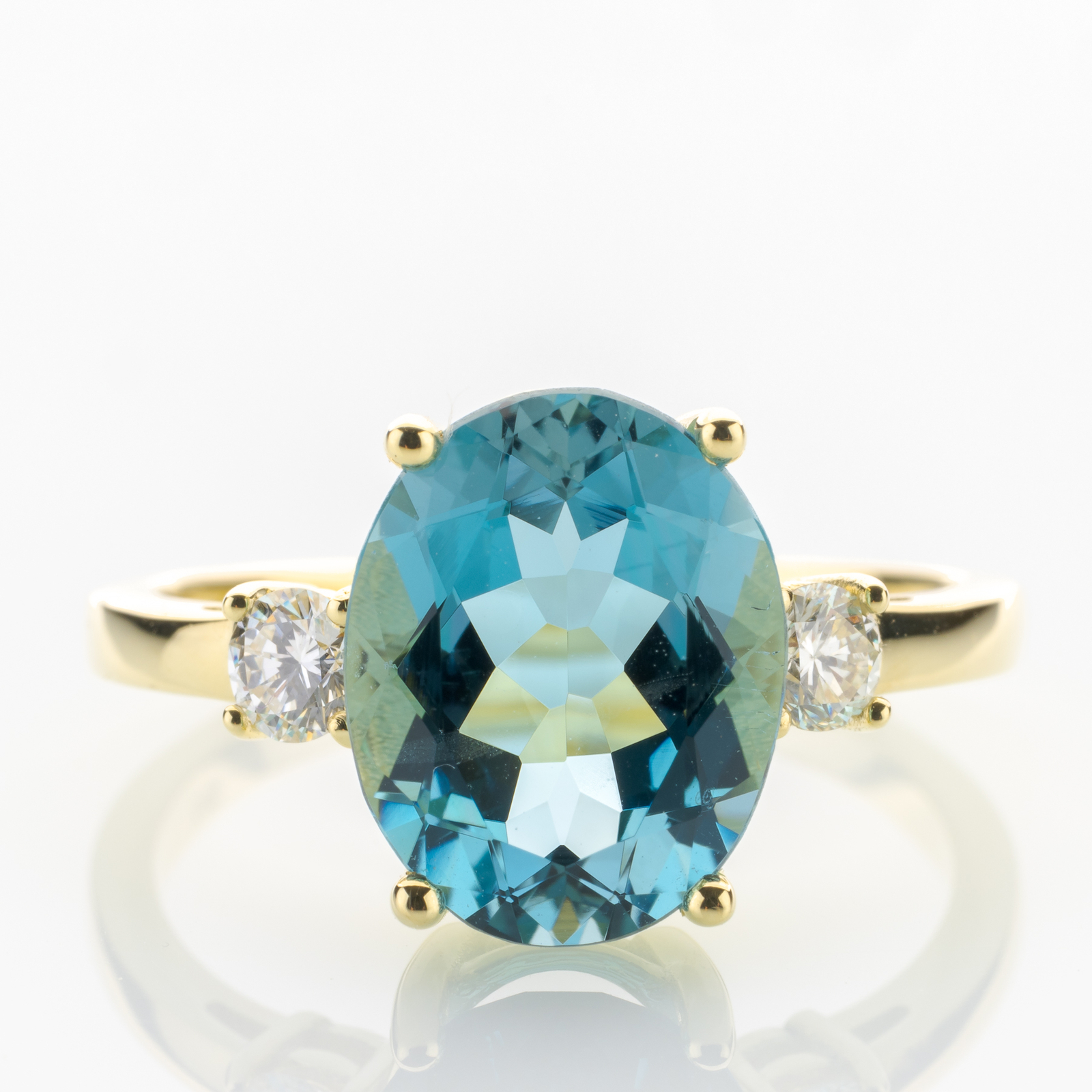 14k gold ring with an aquamarine and diamonds