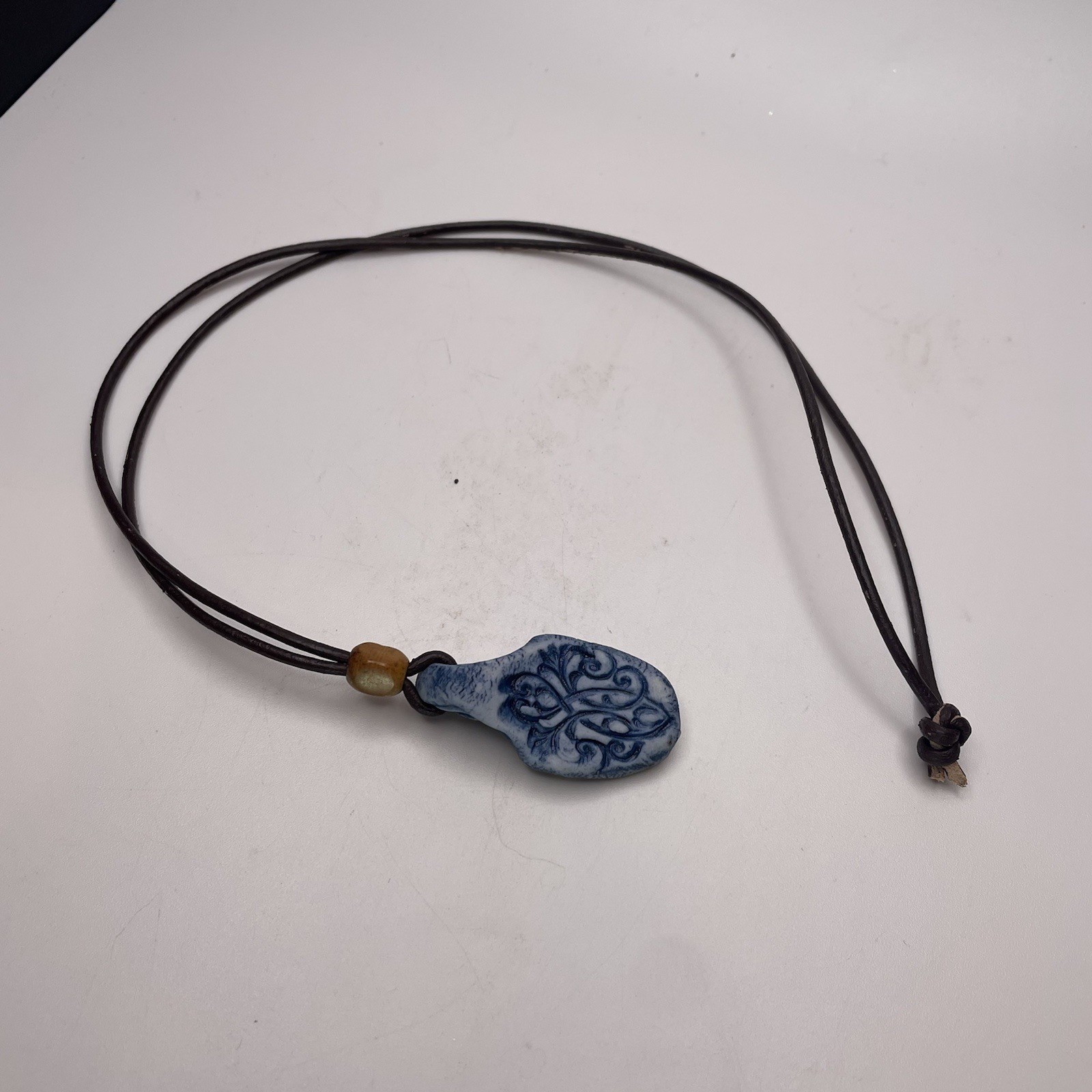 Vtg Handmade Ceramic Charm Leather Cord Necklace Stone Bead Scroll Print 24”