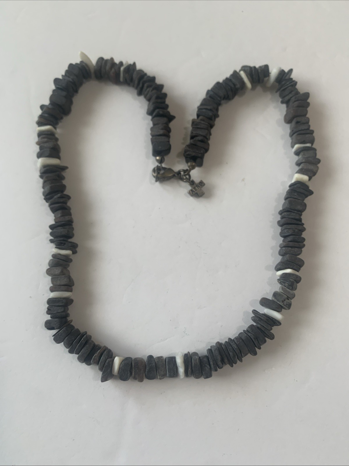 Vintage Aeropostale (AERO 1987y) beaded bracelet with a cross charm. N57
