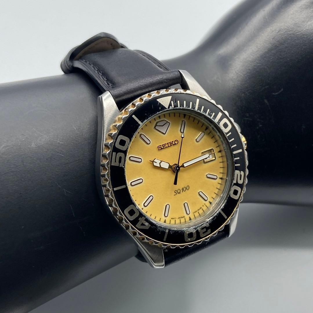 Seiko SQ100 V742-8A00 Divers Wristwatch Yellow Dial Stainless Steel Black