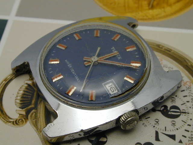 VINTAGE 1960S TIMEX BLUE DIAL RED HANDS AND MARKERS WRIST WATCH