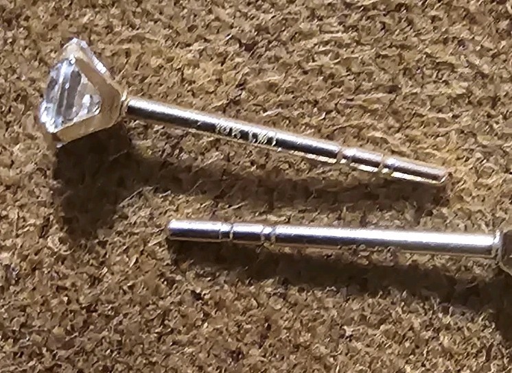 Tiny Round Moissanite Stud Earrings in 10k Yellow Gold