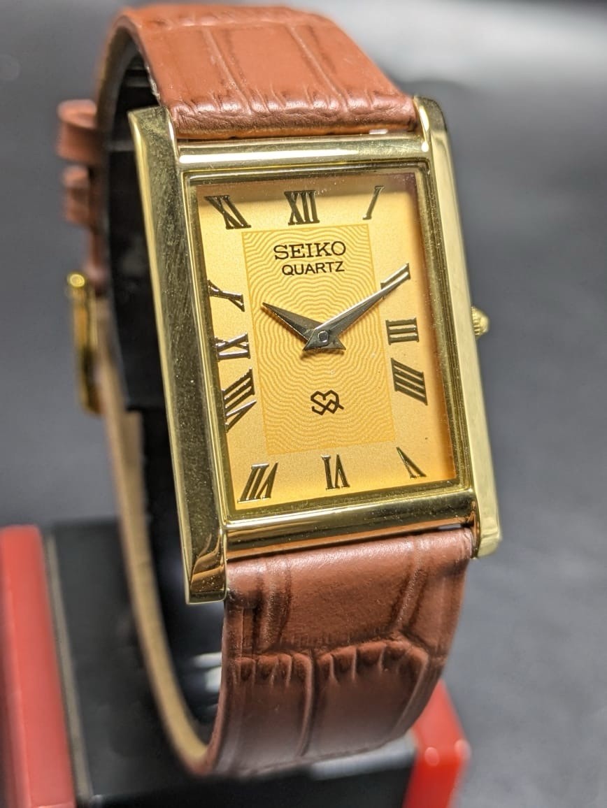Seiko Quartz Rectangular Green Dial Black Band Roman Numerals Men’s Watch