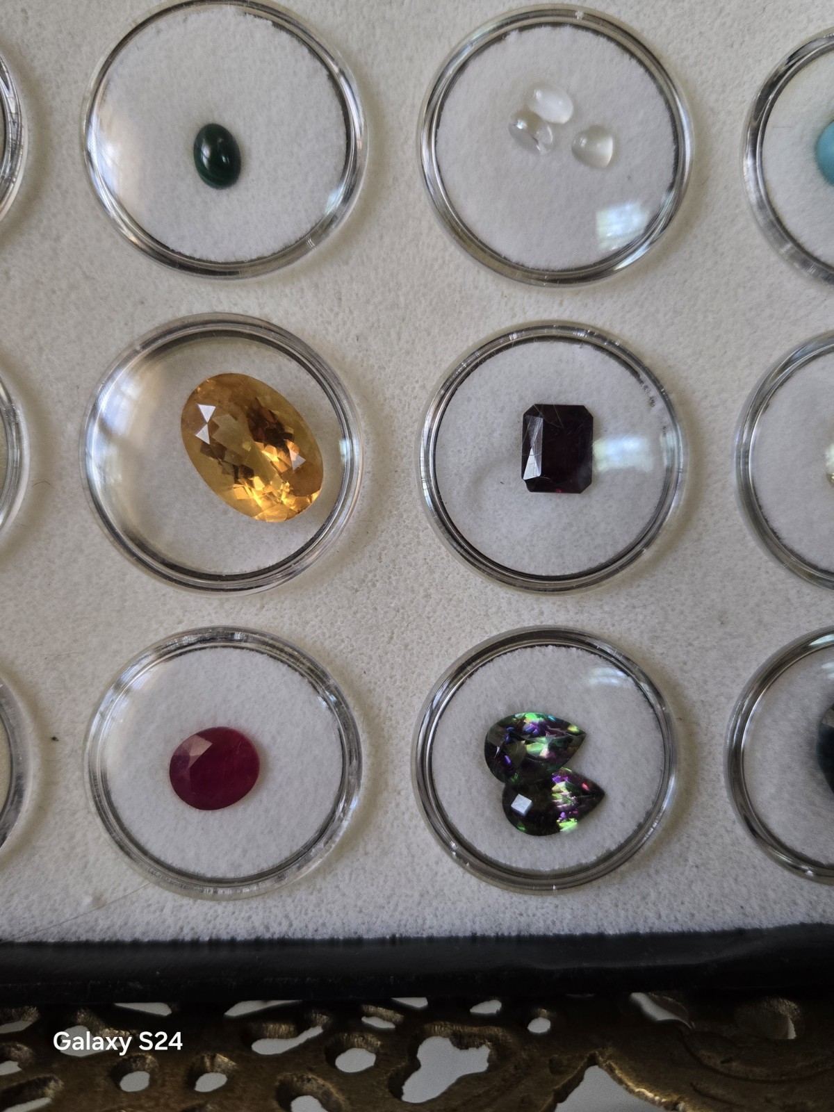 Lots Of Loose Faceted Mixed Colors Gemstones In A Display Case- ** ESTATE…