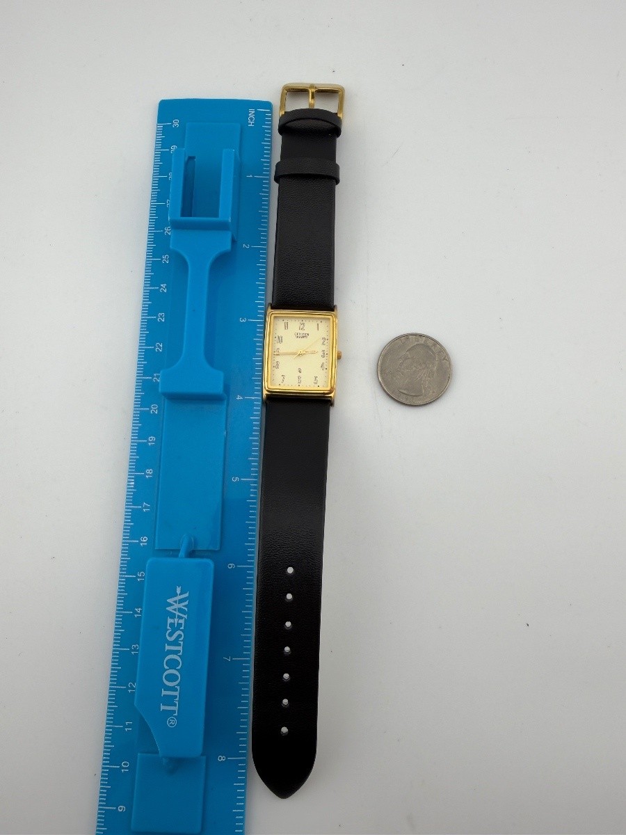 Citizen 3630 Gold Tone Rectangle Quartz Wristwatch Champagne Dial Black tank 