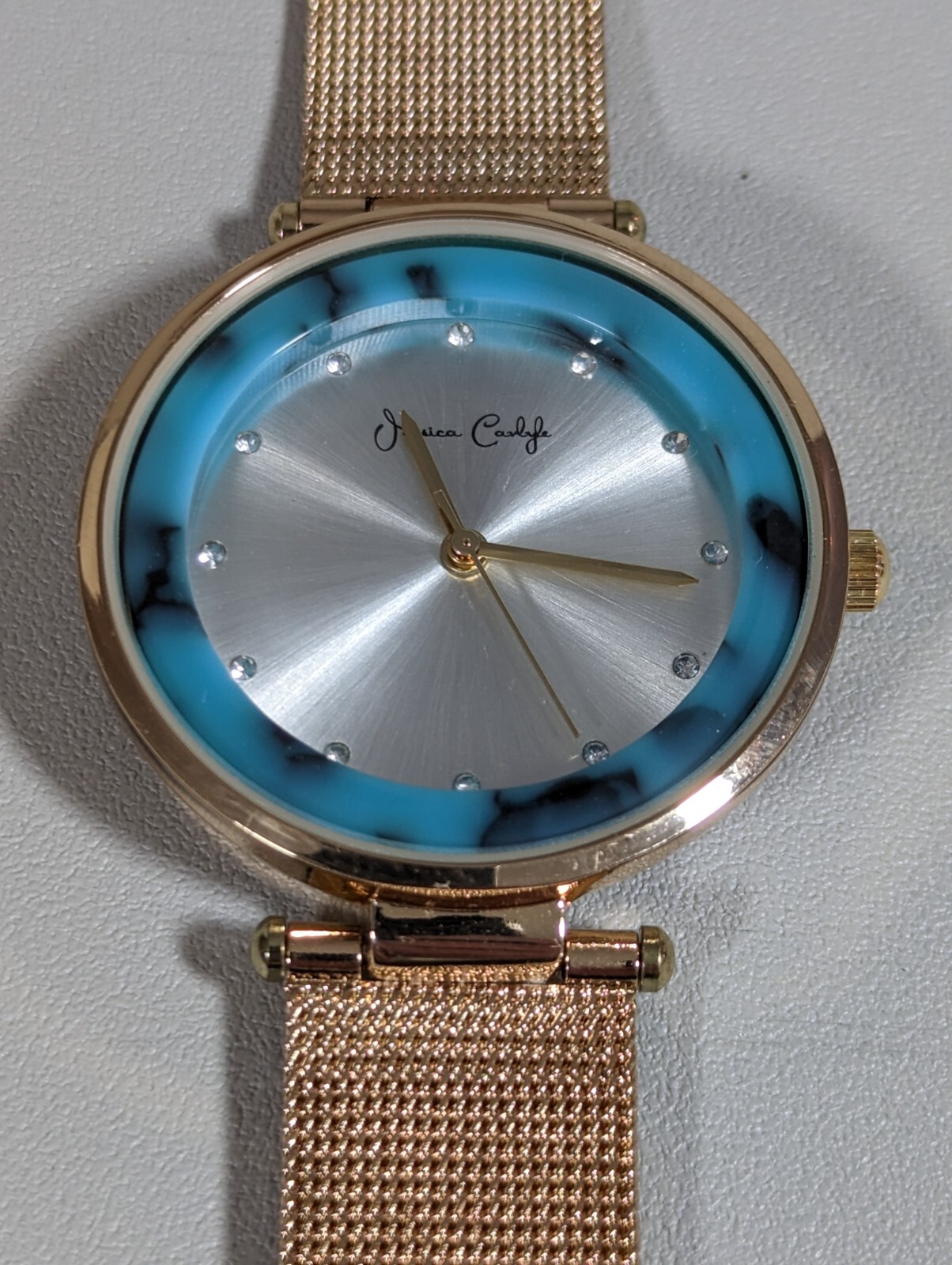 Jessica Carlyle Silver Tone Dial Blue Bezel Round Gold Tone Case Mesh Band Watch