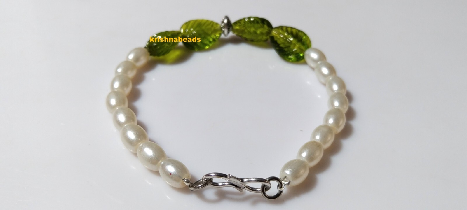 PEARL BERYL & PERIDOT HYDRO LEAF CARVED PEAR 11-14MM 7″INCH BRACELET BEADS