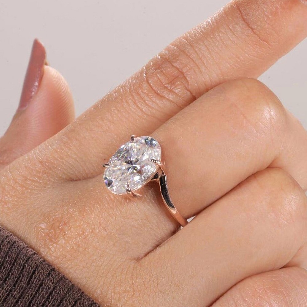 5.50 CTW Oval Cut VVS1 Moissanite Bypass Engagement Ring In 14k Rose Gold Plated