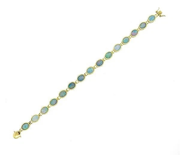7.00Ct Oval Lab Created Fire Opal Women’s Tennis Bracelet 14K Yellow Gold Plated