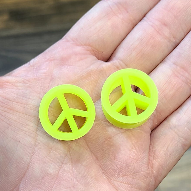 Pair of UV Glow Silicone Peace Sign Ear Plugs Tunnels 3 Colors 7 Sizes Available