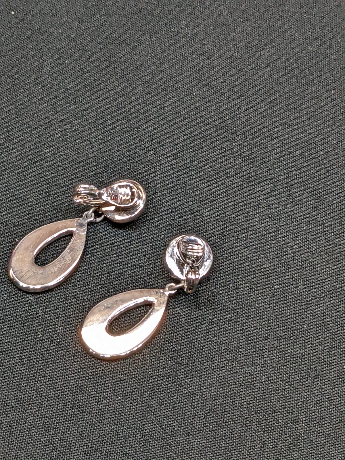 Vintage Monet Teardrop Earrings Dangle Clip On Polished Silver Tone Chrome Shiny