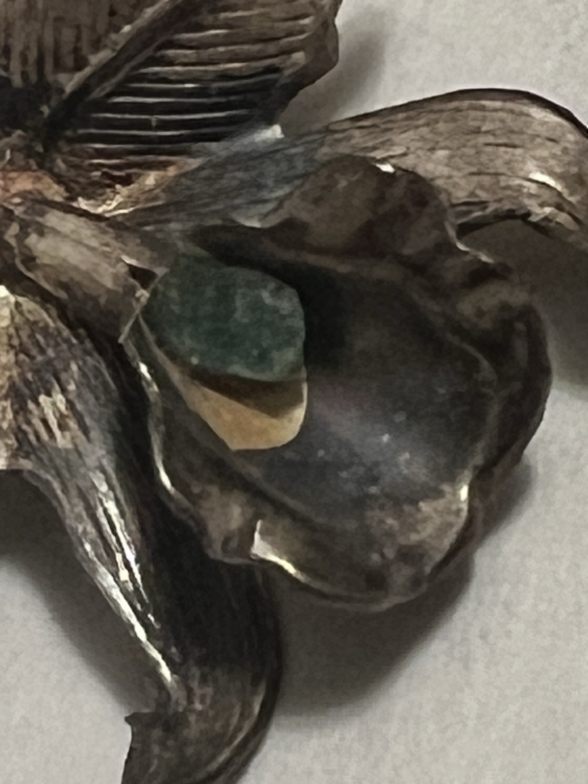 Vintage 1950s 3D orchid flower pin solid silver genuine, raw uncut green Emerald