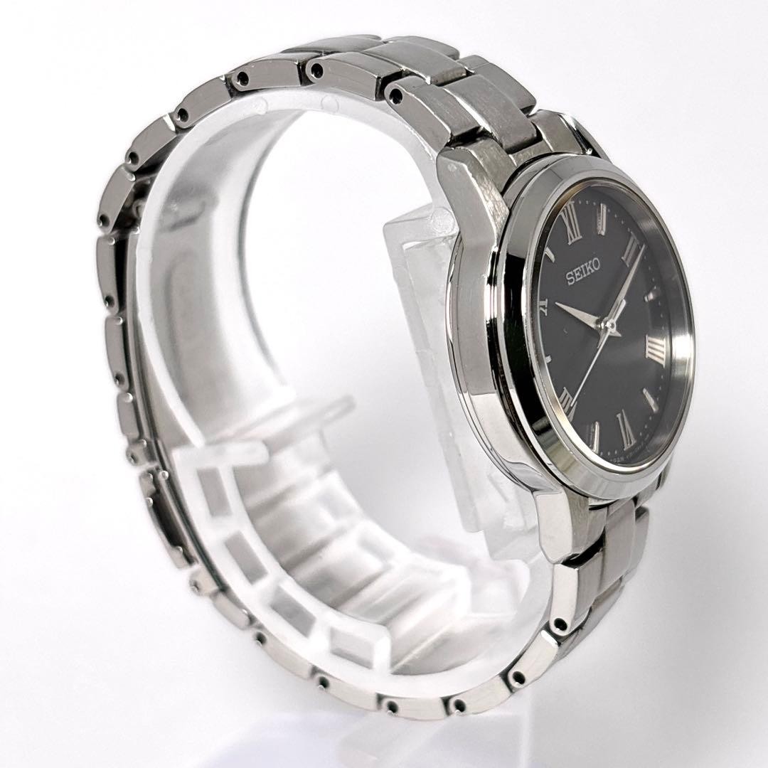 SEIKO V131-0AF0 Solar Ladies Watch Quartz Round Roman Black Dial Stainless Steel