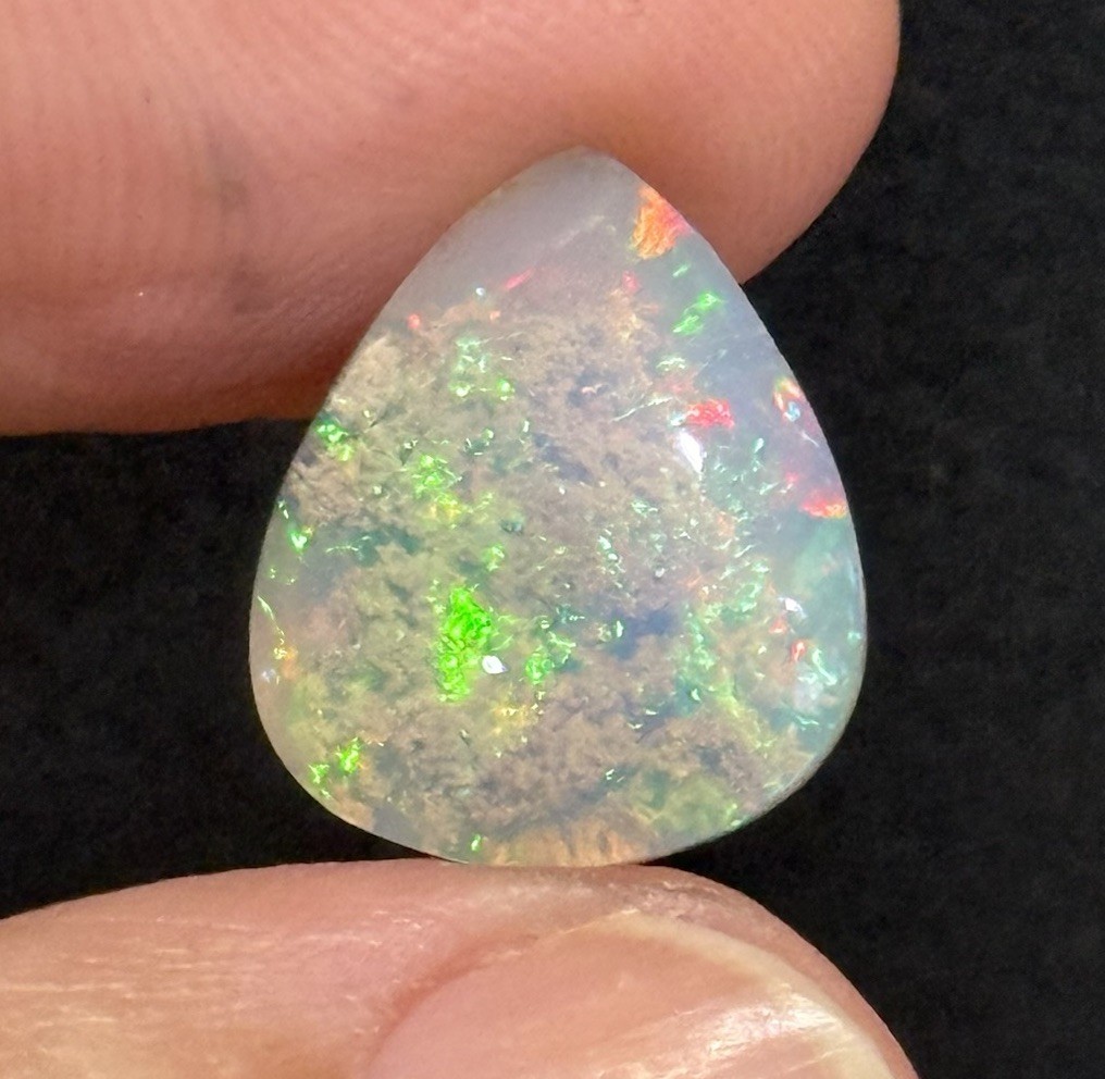 6.85ct 15.2×13.3×6.7mm Fine Galaxy Ethiopian Welo Opal Pear Shaped Cabochon Gem