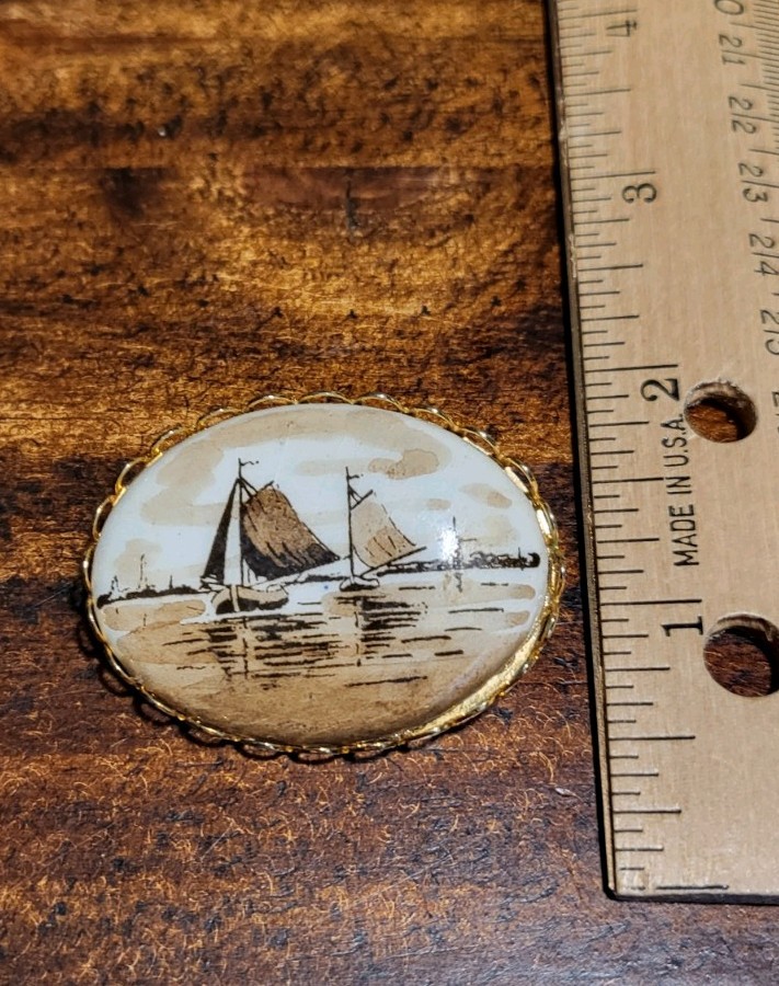 1950’s Sepiatone Sea and Sailboats Delftware-Style Ceramic Brooch Brown