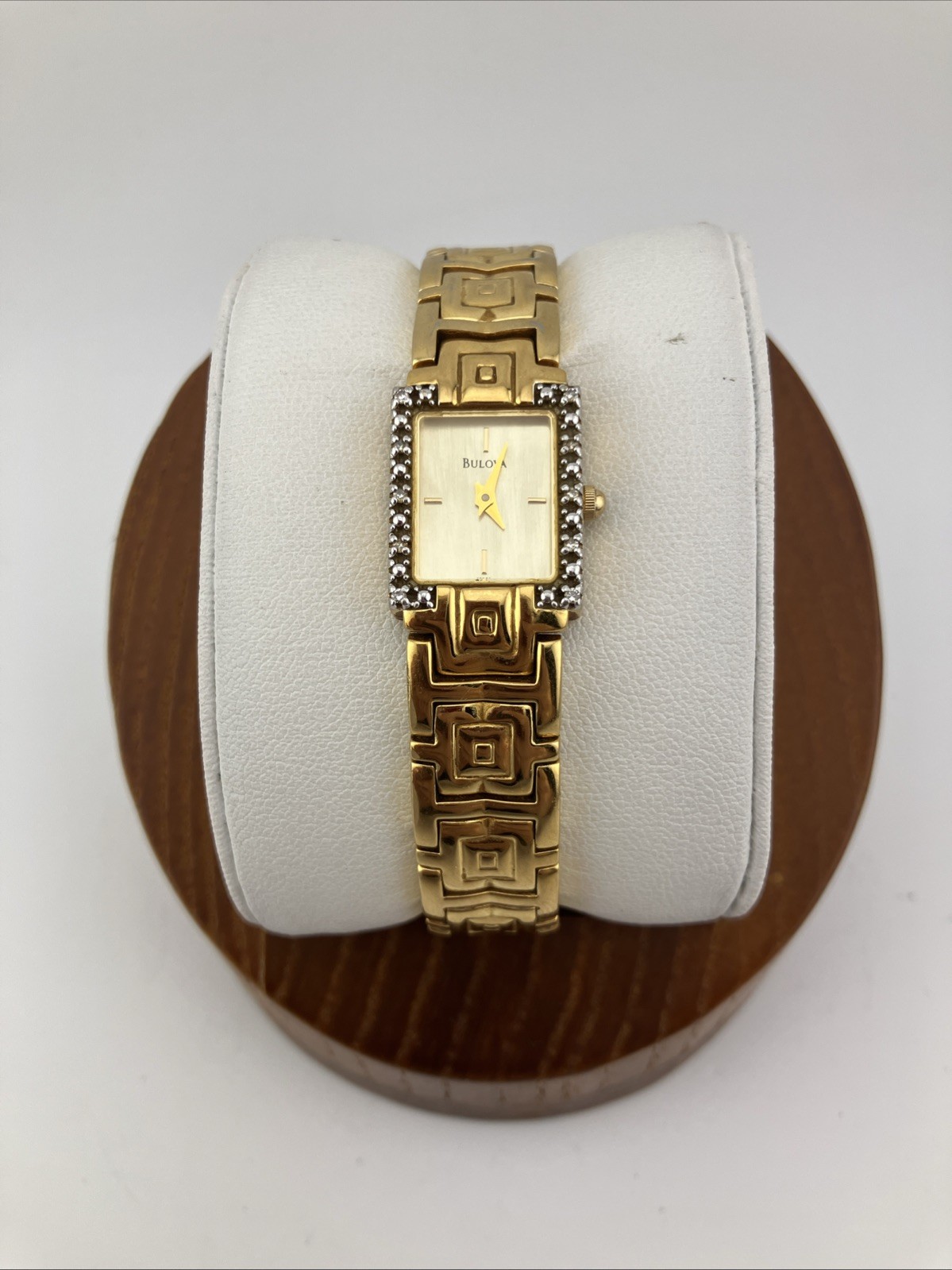 Vtg 2000 BULOVA Ladies 16mm Watch Gold Tone DIAMONDS Bezel MOP Tank 6.5″ – RUNS