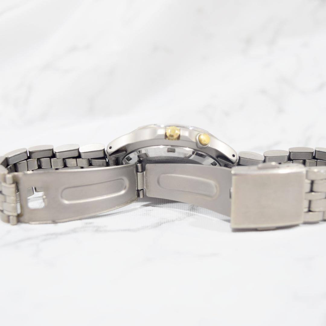 1996 SEIKO Spirit AGS Titanium watch with date display, non-functional.