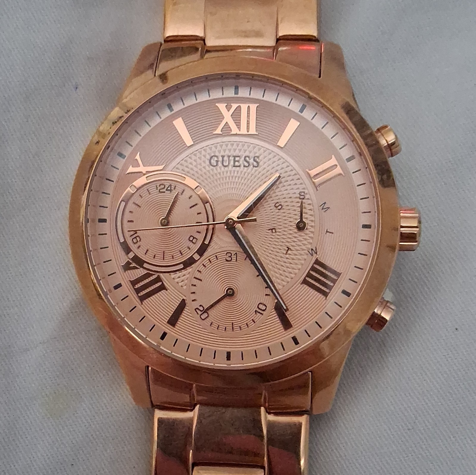 GUESS Women’s Rose Gold Tone Analog Quartz Multi-Dial Bracelet Watch