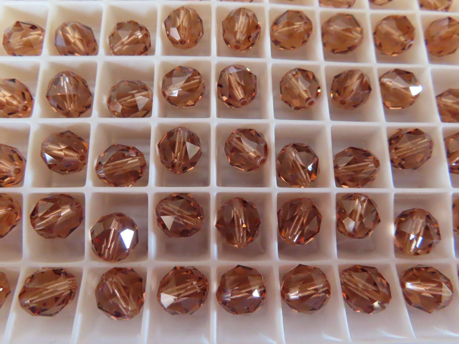24 Swarovski Crystal faceted beads 8mm Light Smoked Topaz. #5025