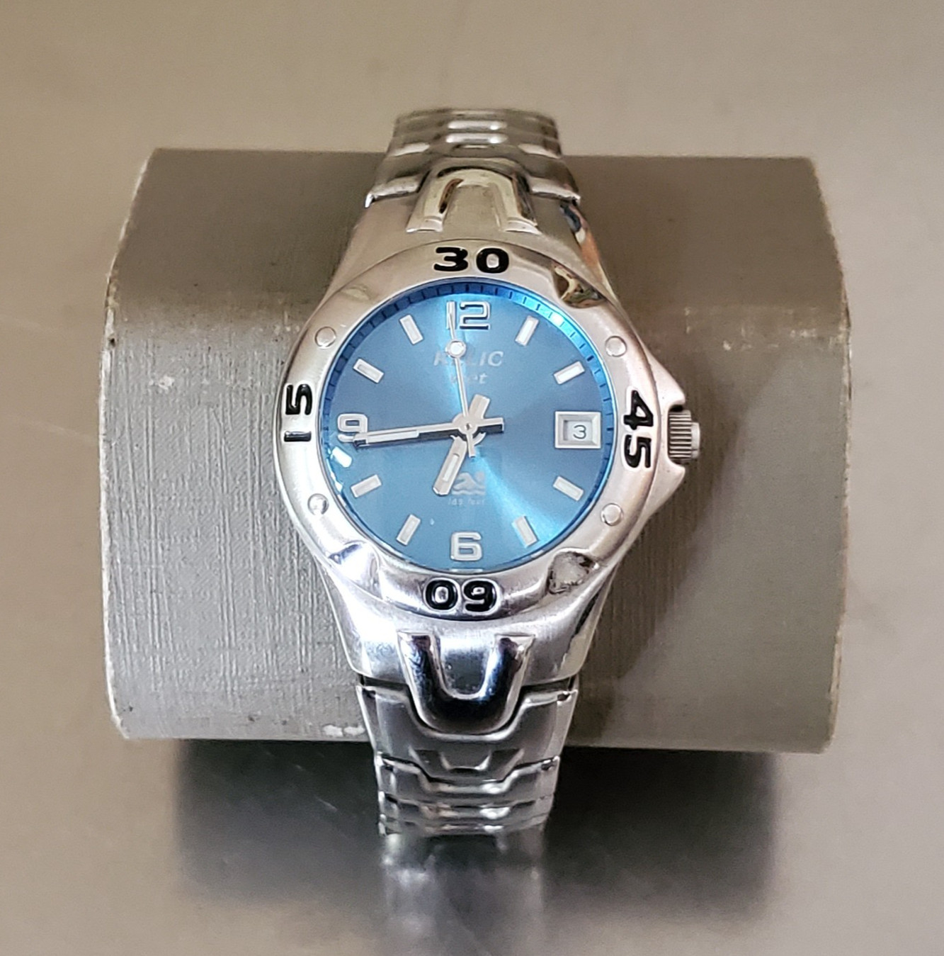 RELIC Wet Watch Women’s Analog Date Blue Dial Rotating Bezel Stainless 6 in 31mm