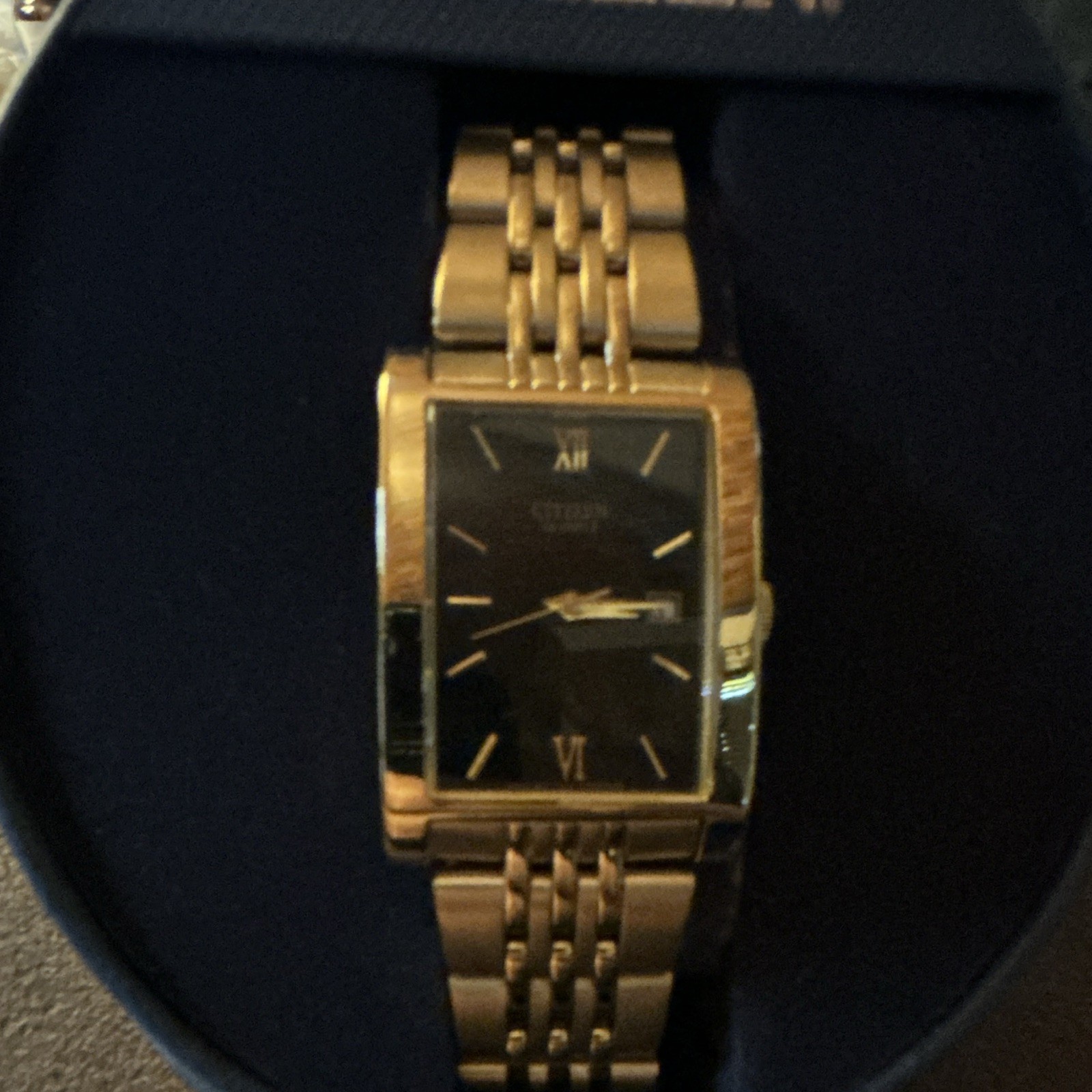 Citizen Eco-Drive Rectangle Black Dial Roman/Stick Gold-Tone Bracelet Watch