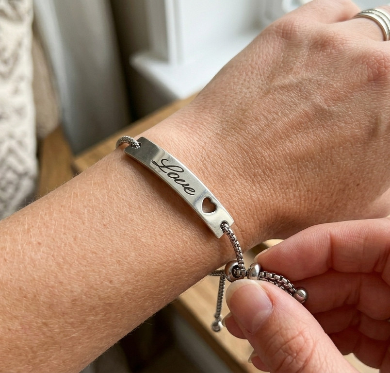 Silver Finish Stainless Steel Adjustable LOVE Engraved Cutout Heart Bracelet