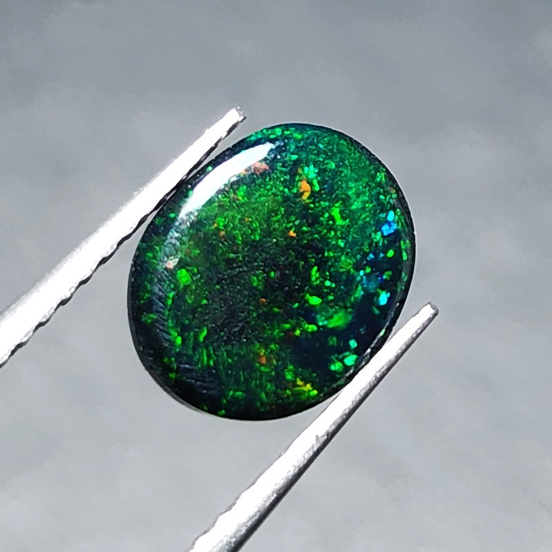 Ethiopian Welo Black Opal AAA+ Oval Cabochon Strong Green Play Loose 1.20Ct Gem