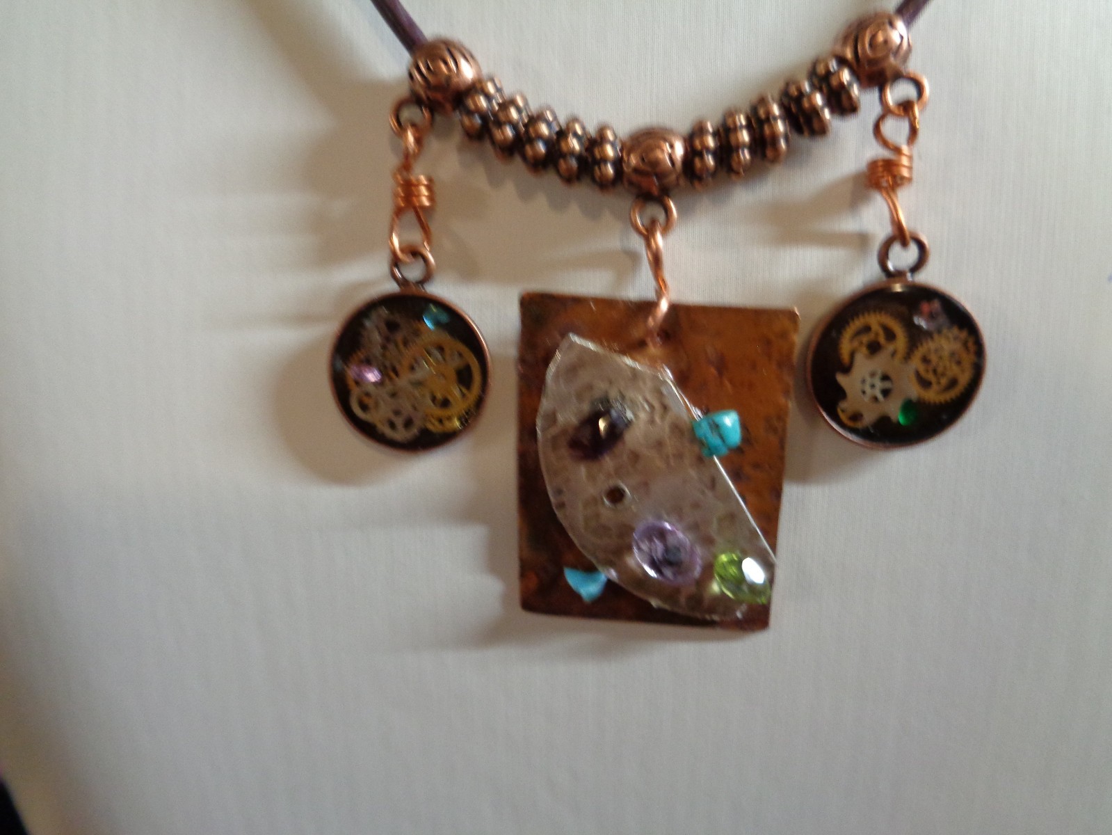 Artisan crafted,eclectic,18” necklace. Central handcrafted copper collage pendan
