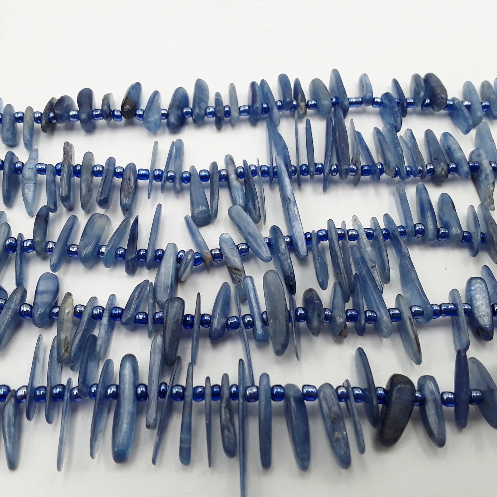 Kyanite Graduated Pebble Slice Stick Points Beads Approx 15-30mm 15.5″ Strand
