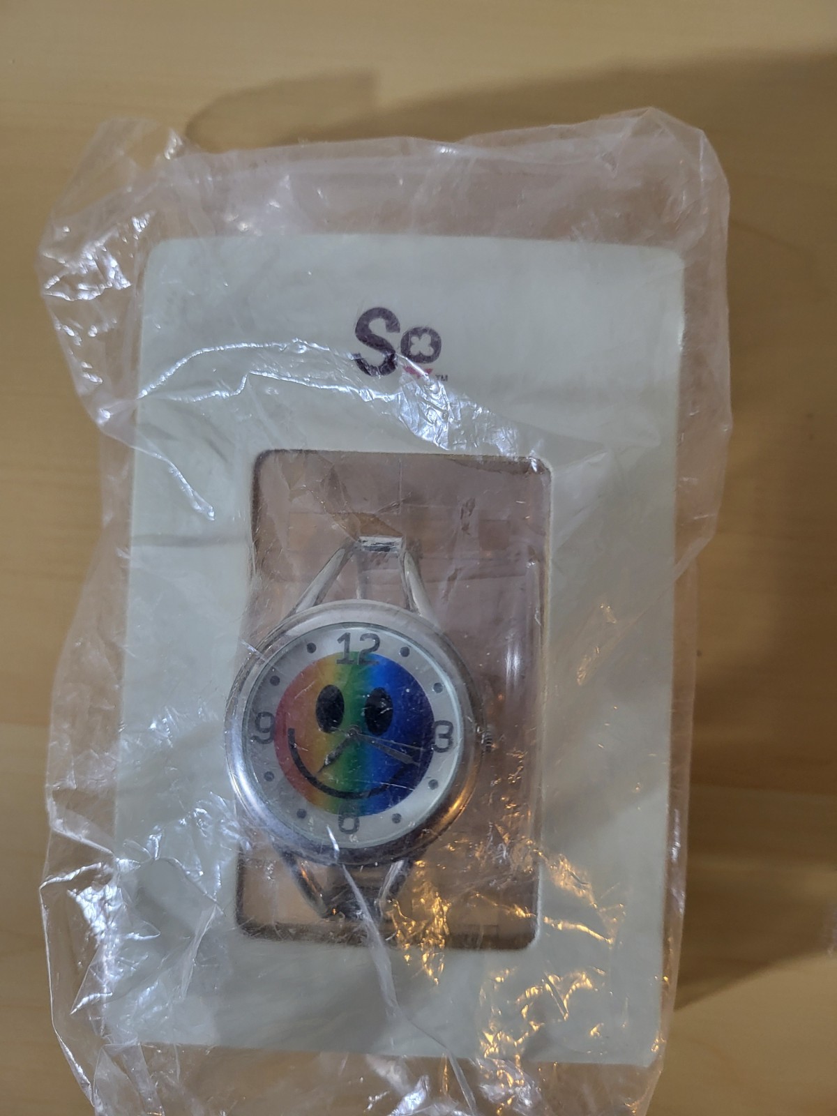 S.O. brand(Kohls) rainbow color smiley face womens analog watch