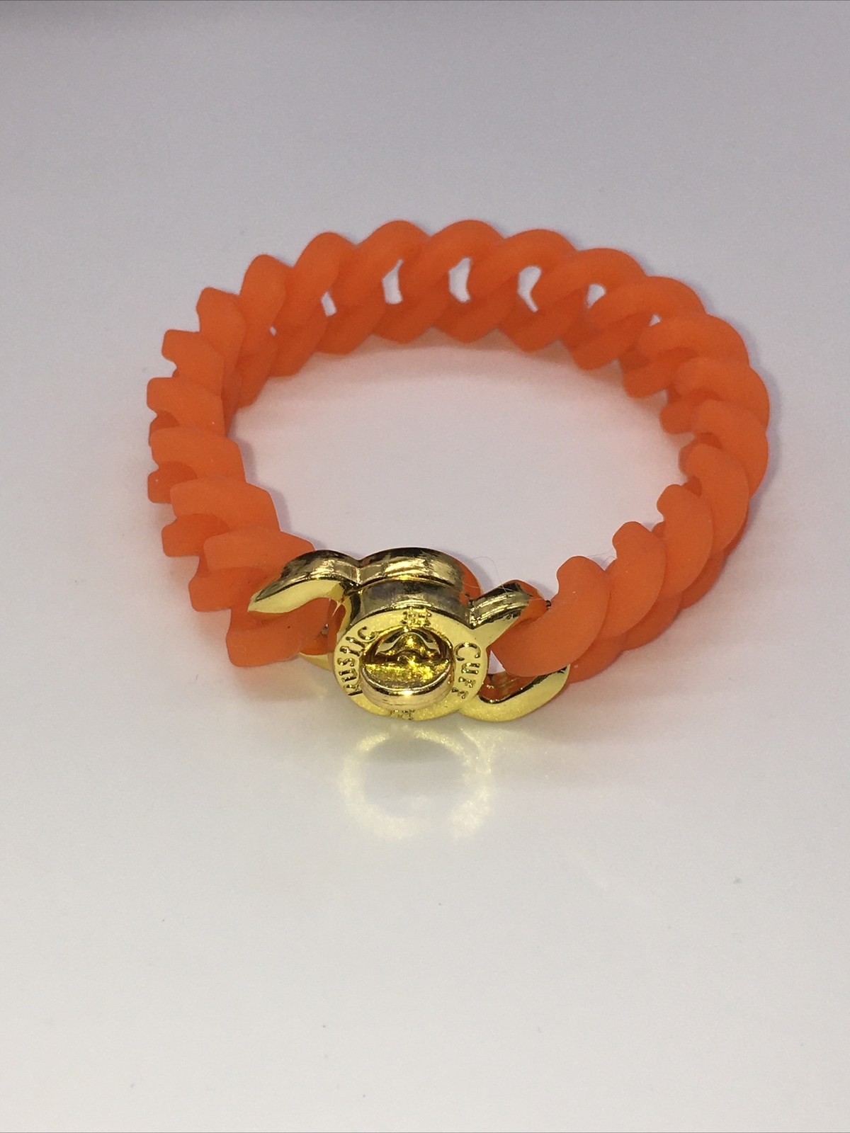 Rustic Cuff Gold Tone Logo Turn Lock Orange Silicone Stretch Mock Chain Bracelet