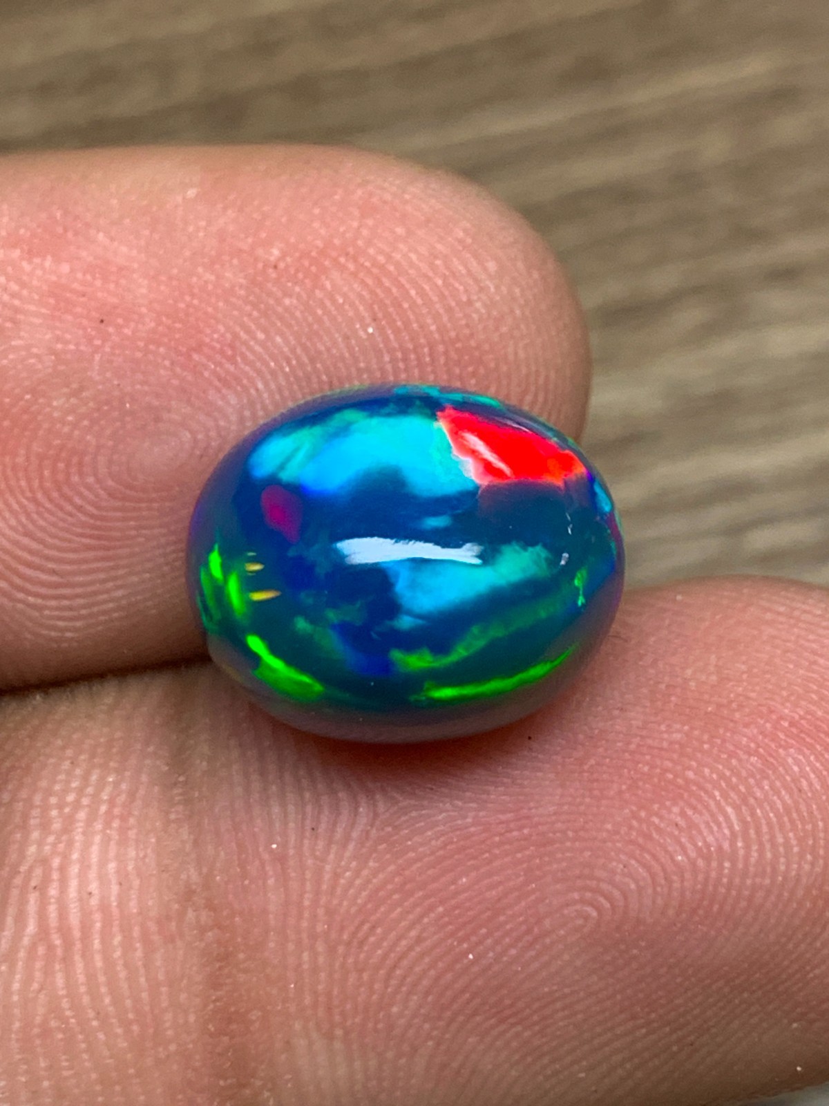 Ethiopian Opal Gemstone 6.35crt Black Oval Cabochon Rainbow Flash Welo Loose Gem