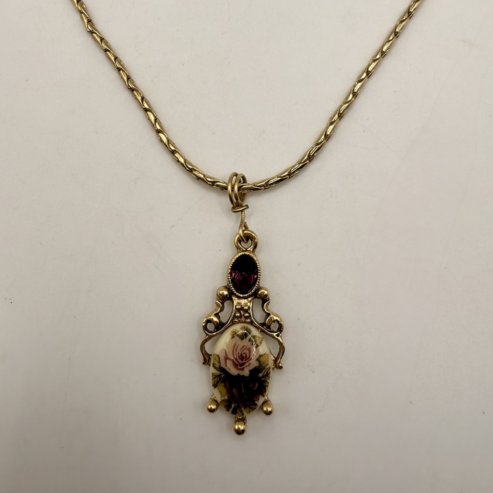 Vintage 1928 Gold Tone Rose Pendant Necklace Amethyst Purple Rhinestone
