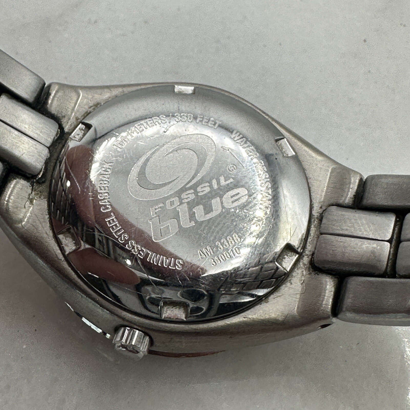 Fossil AM3388 Watch, Purple Dial, Silver Tone, New Battery Sz. 6.25”
