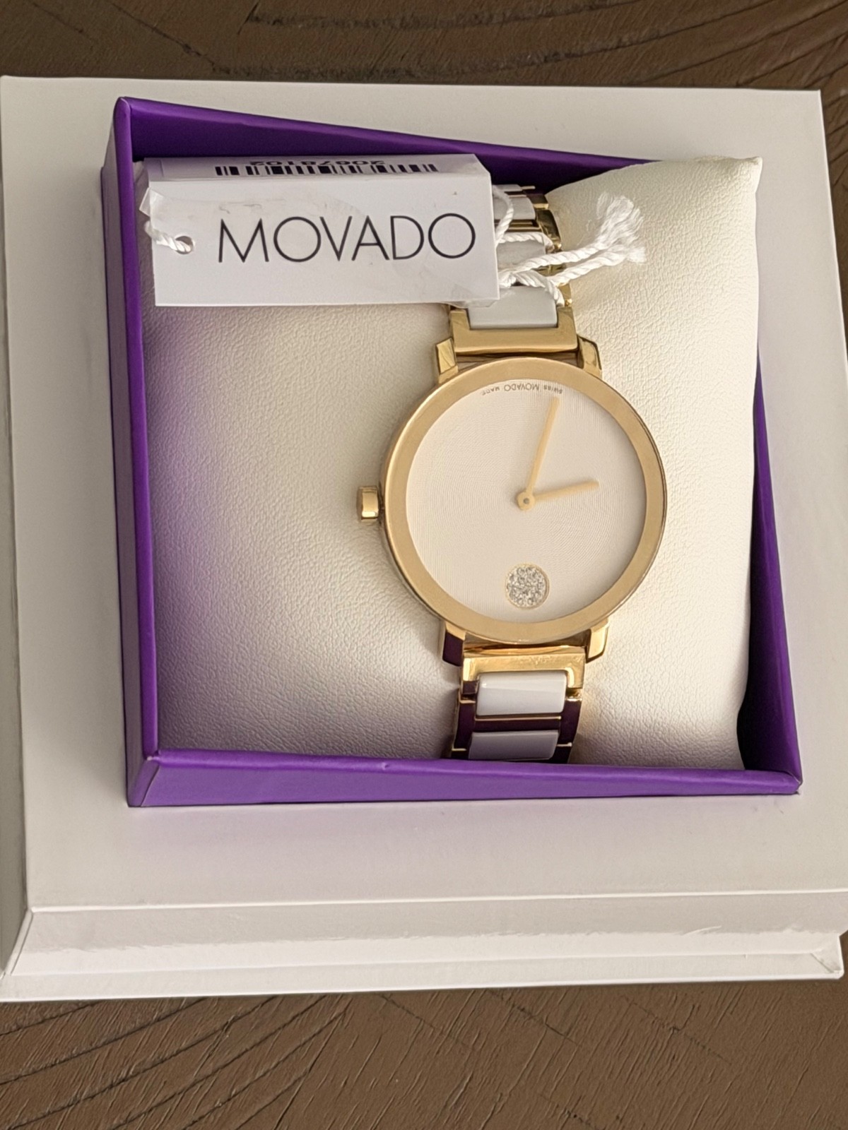 movado womens watch white and gold