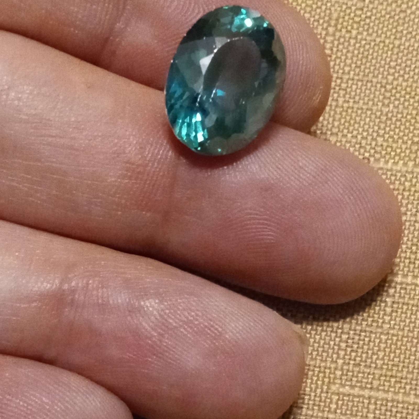 VS 12.98 ct natural green topaz oval shaped coated