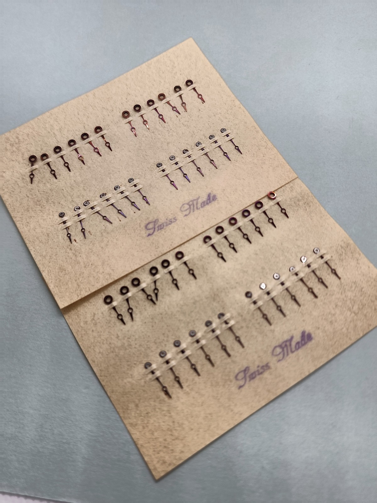 2 Cards (24 Sets) Of NOS Swiss Plum Moon Hr/Min Hands With 135/65 Hole Sizes