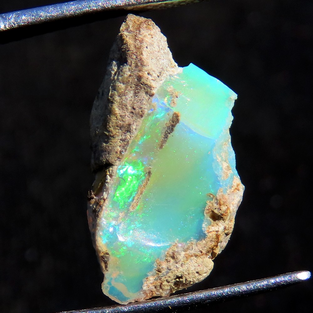 3.45 Carat. Genuine Play of MultiColor Ethiopian Opal Rough Gemstone 08x16x05 mm