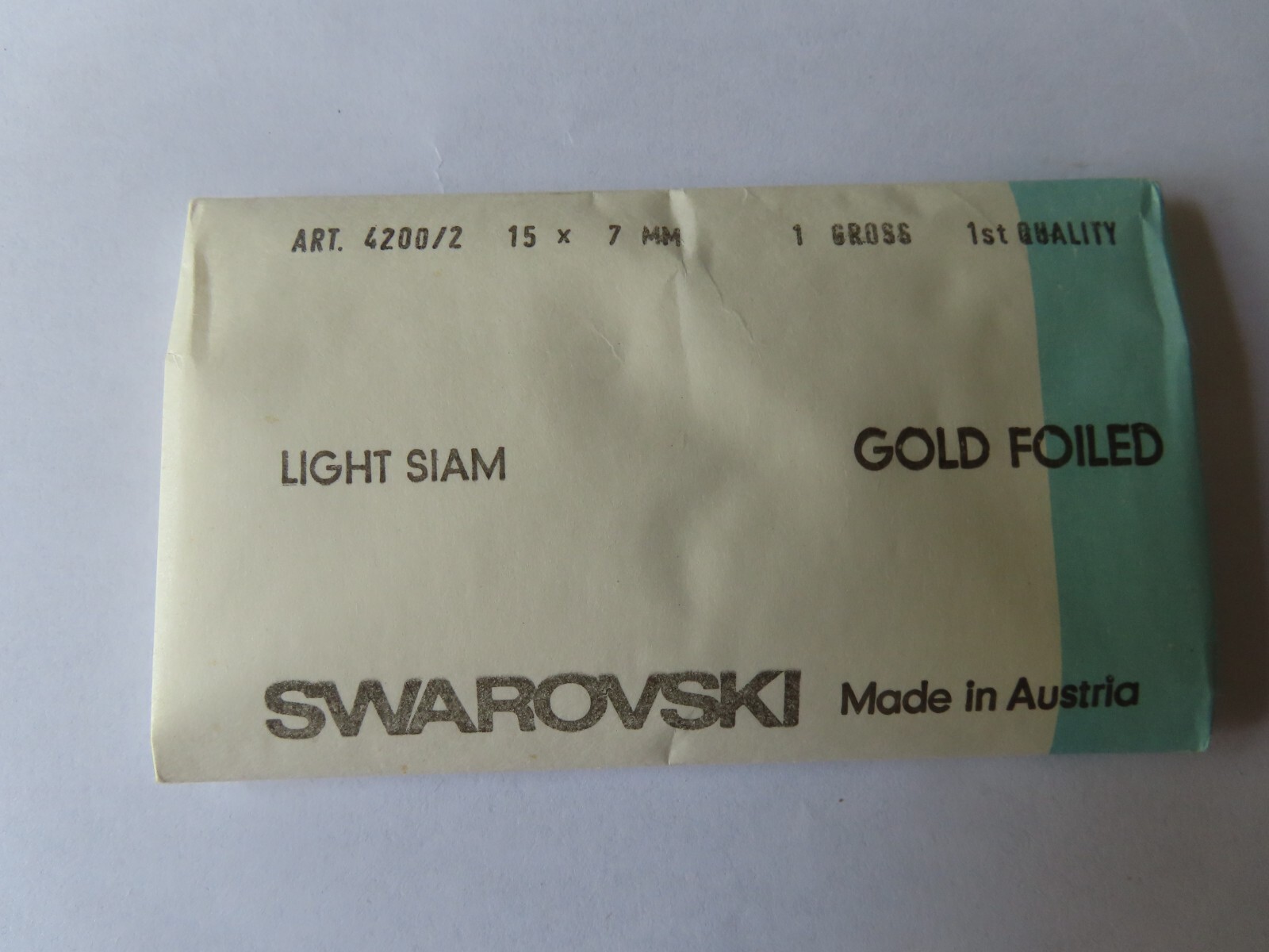 36 Swarovski Navettes in 15x7mm Light Siam. #4200/2