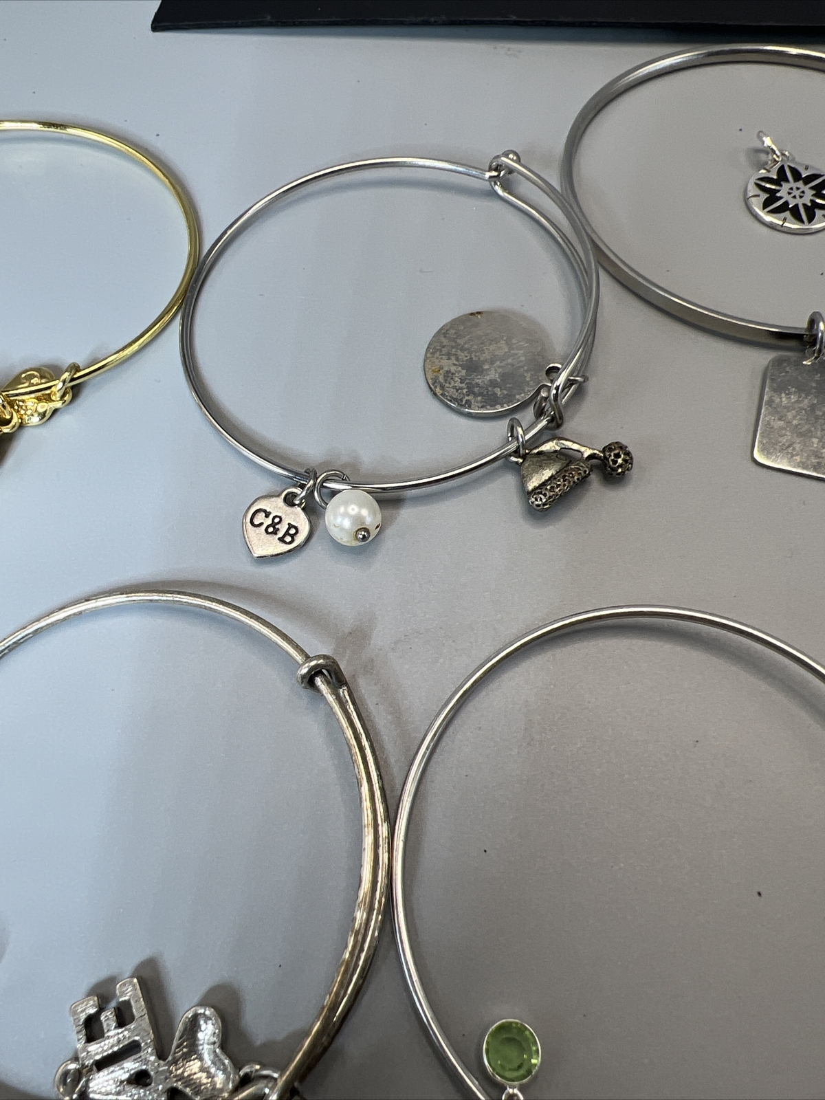20- Bangle Bracelets w/Charms (11-C&B “Christopher & Banks” & 7 Un-Marked) M2164