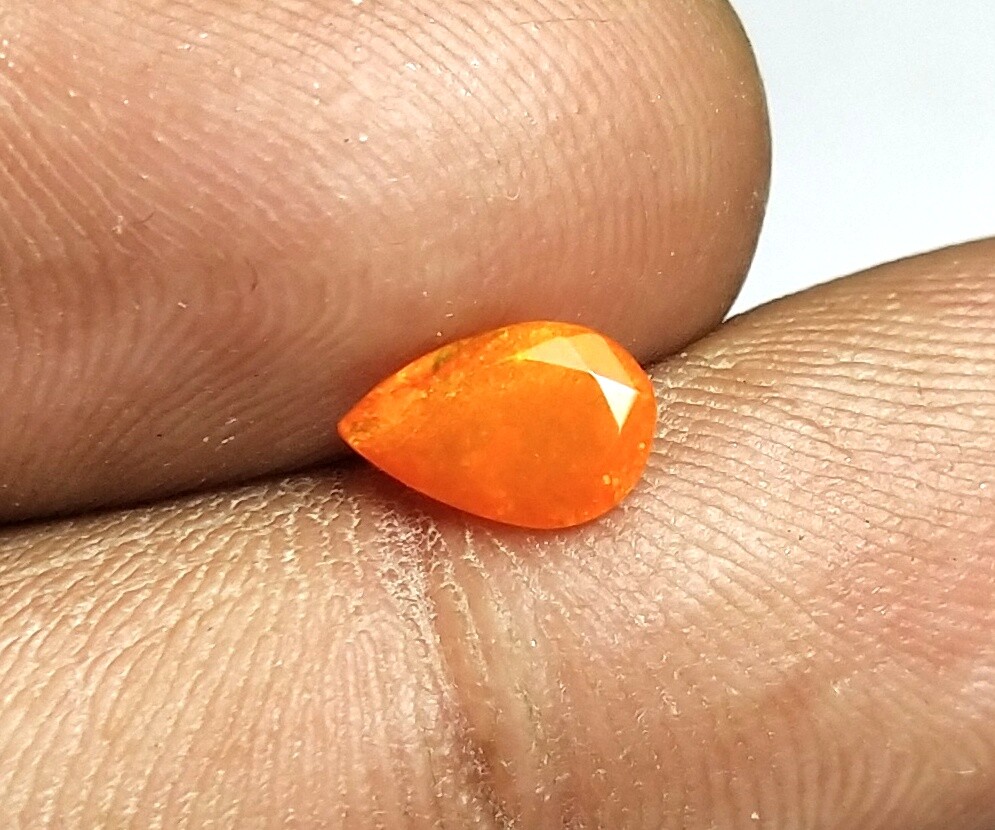 AAA+ Natural Ethiopian Opal Faceted Pear Shape 0.45 Cts Multi Fire Orange Opal