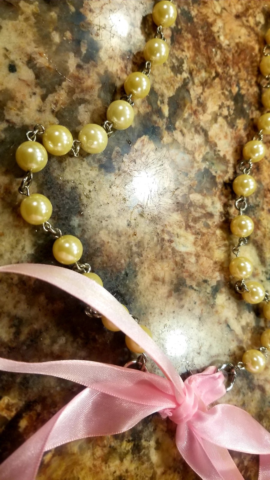 Strand of old fashioned 1960s Pearl’s with pink silk ribbon necklace/belt
