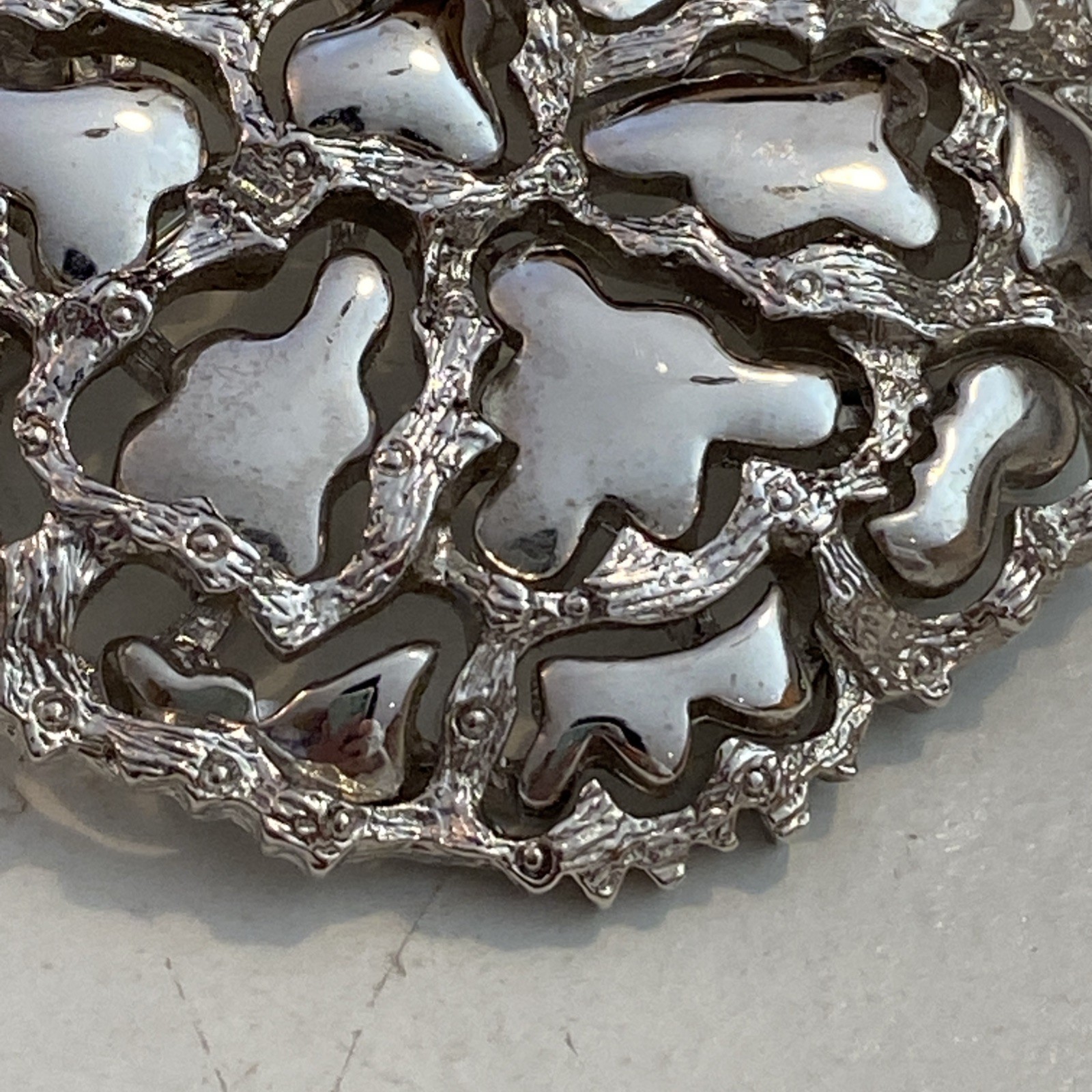 Vintage Roget TM Silver Tone Metal Modernist Perforated Pattern Branch Shiny Pin