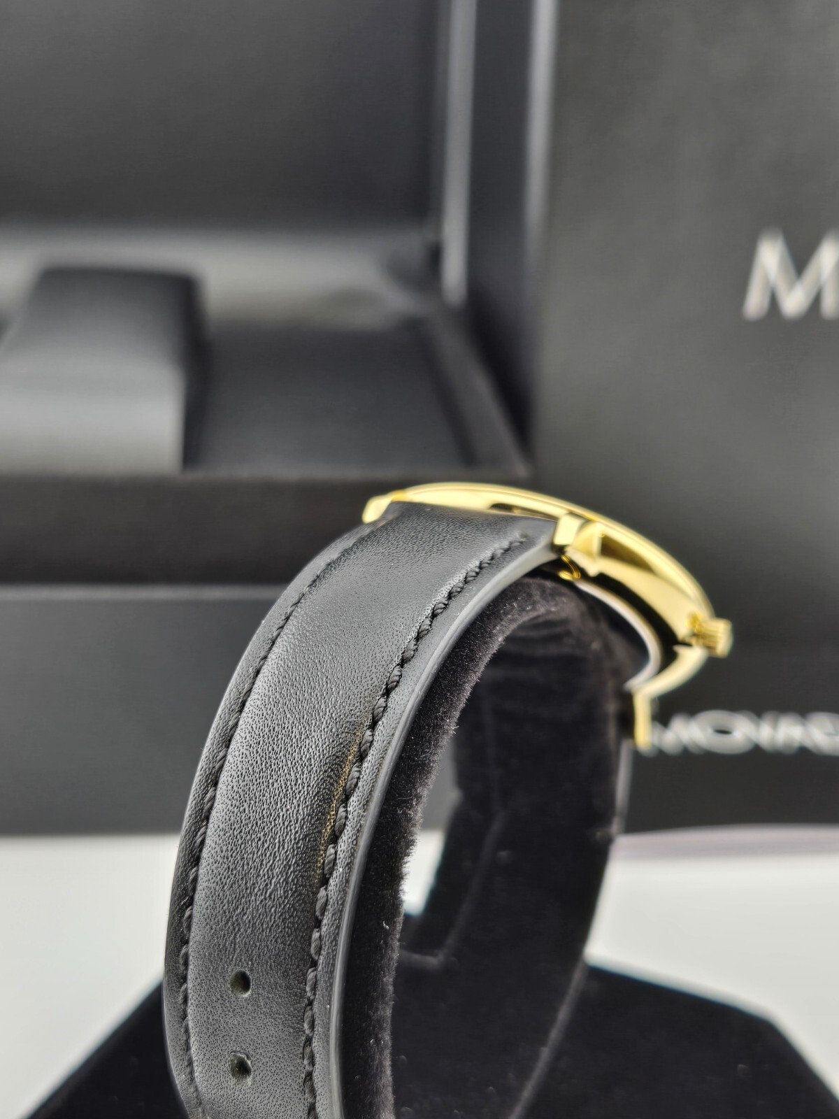 Movado Women’s Ultra Slim Black Dial Gold Tone Case Watch – 0607091 ($795 MSRP)