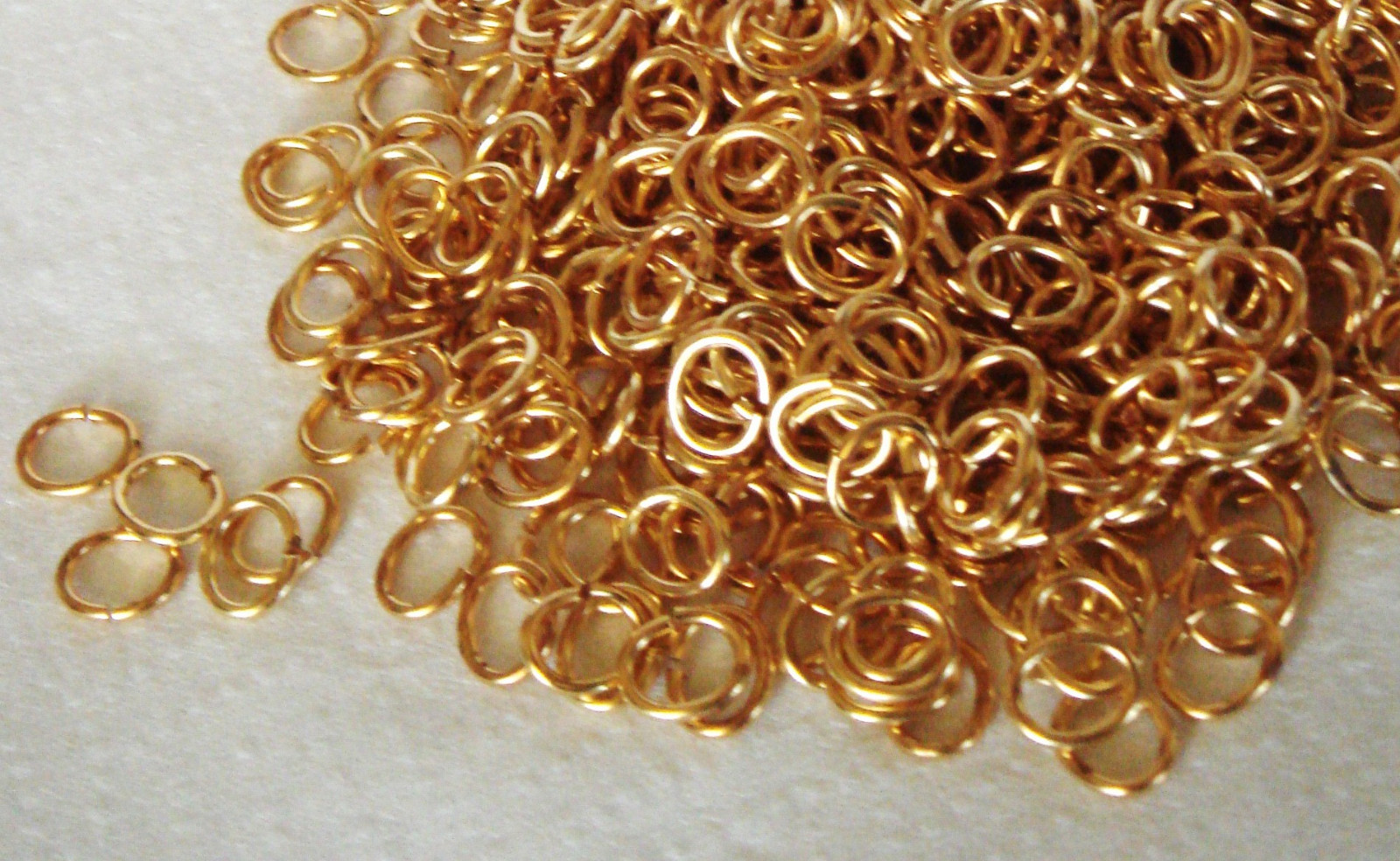 JUMP RINGS BRASS 6.7 x 5.7 mm .85 WIRE BLONDE OVAL SQUARE CUT 200 pcs+