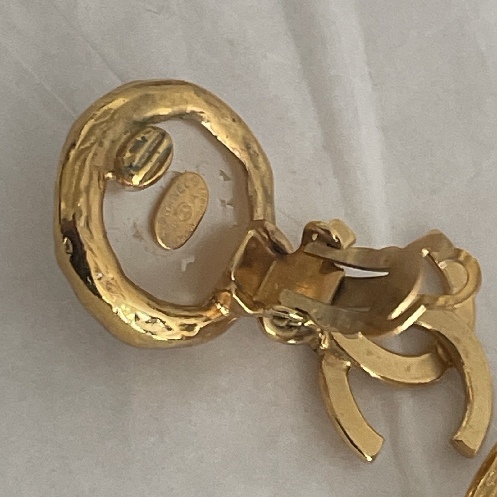 Auth. vtg CHANEL 1995 gold 3D CC logo dangle with round moonlight stone stamped
