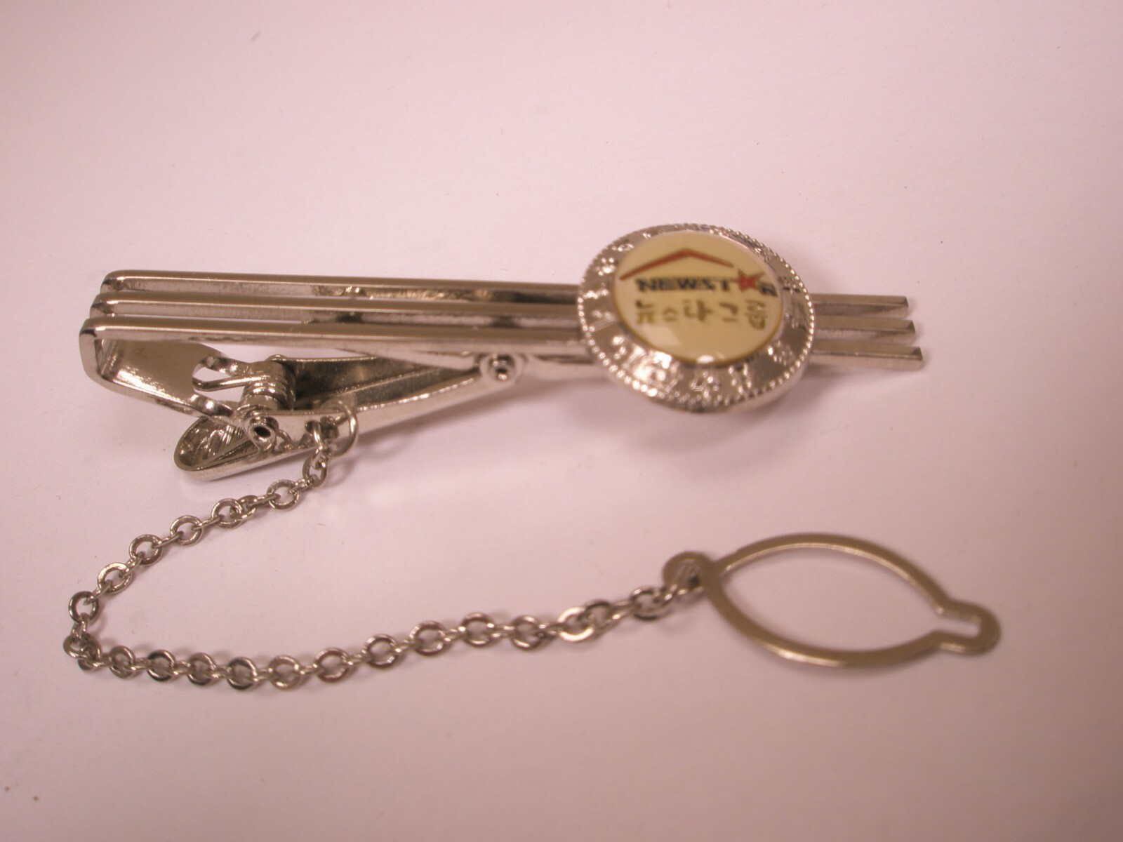 Newstar Realty & Investment Vintage Tie Bar Clip w/chain corporate logo